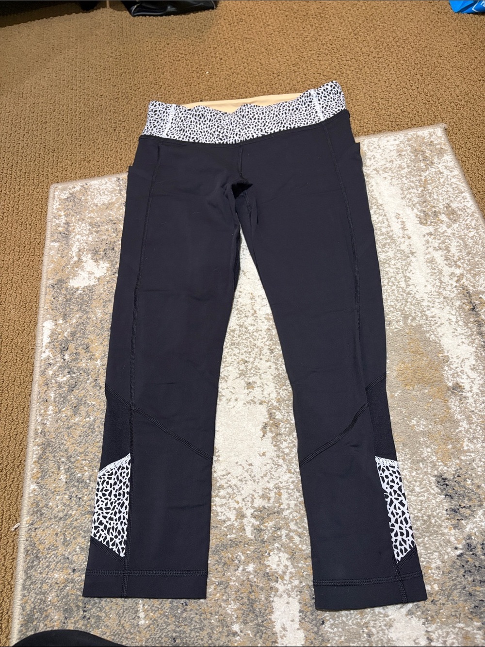 lululemon athletica Black Capri Leggings with White Leopard-Print Accents